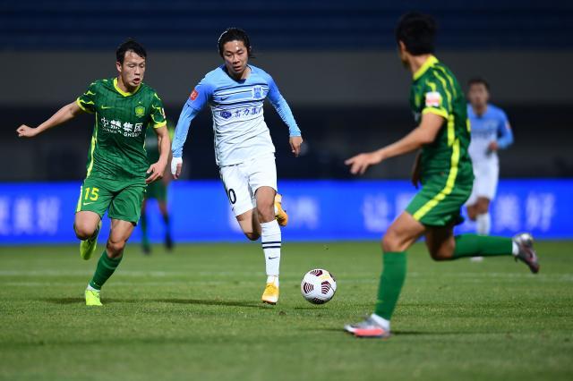 熊猫体育-【中超】张玉宁点球建功李提香救主 国安1比1广州城